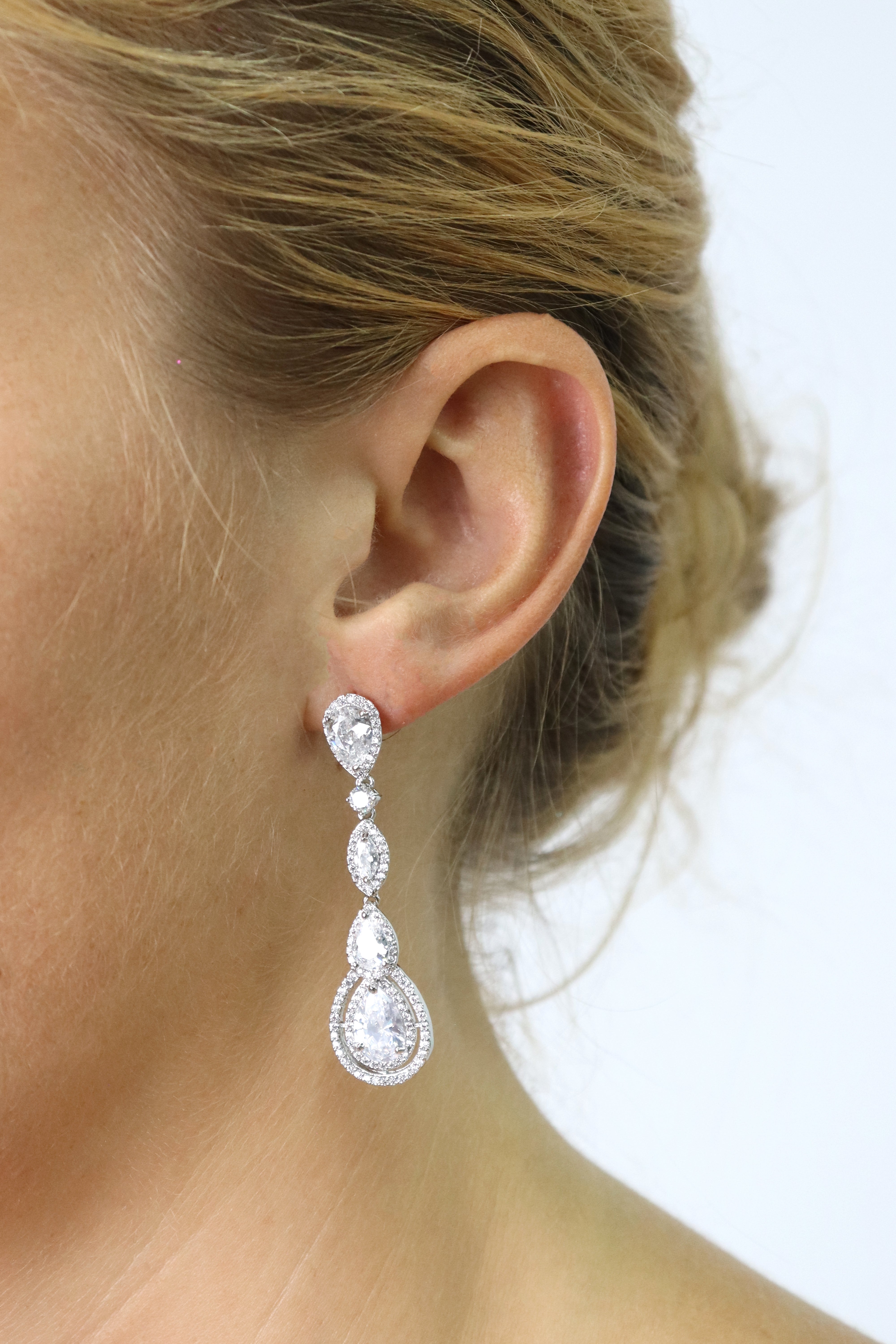Long Tear Drop Silver Earrings Accessory Rene Ruiz Collection